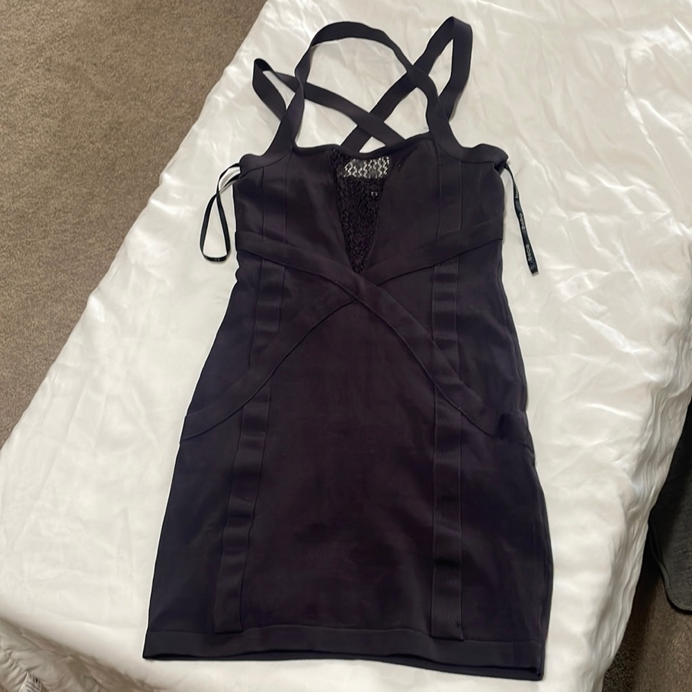 Cute BEBE bodycon dress. Size medium.
